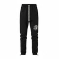 Pantalones de chándal negros AMIRI Precious Memories de The Hype Company con cordones blancos y estampado gráfico.