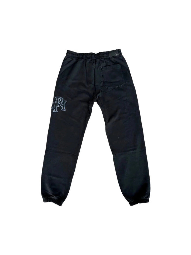 AMIRI STAGGERED BLACK ON BLACK SWEATPANTS AMIRI The Hype Company