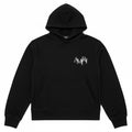 Sudadera negra con capucha AMIRI de The Hype Company con logo metálico escalonado en el pecho y bolsillo canguro.
