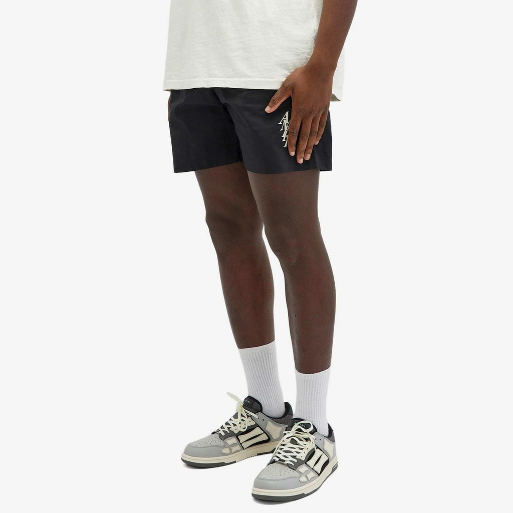 AMIRI STAGGERED SWIM SHORTS BLACK