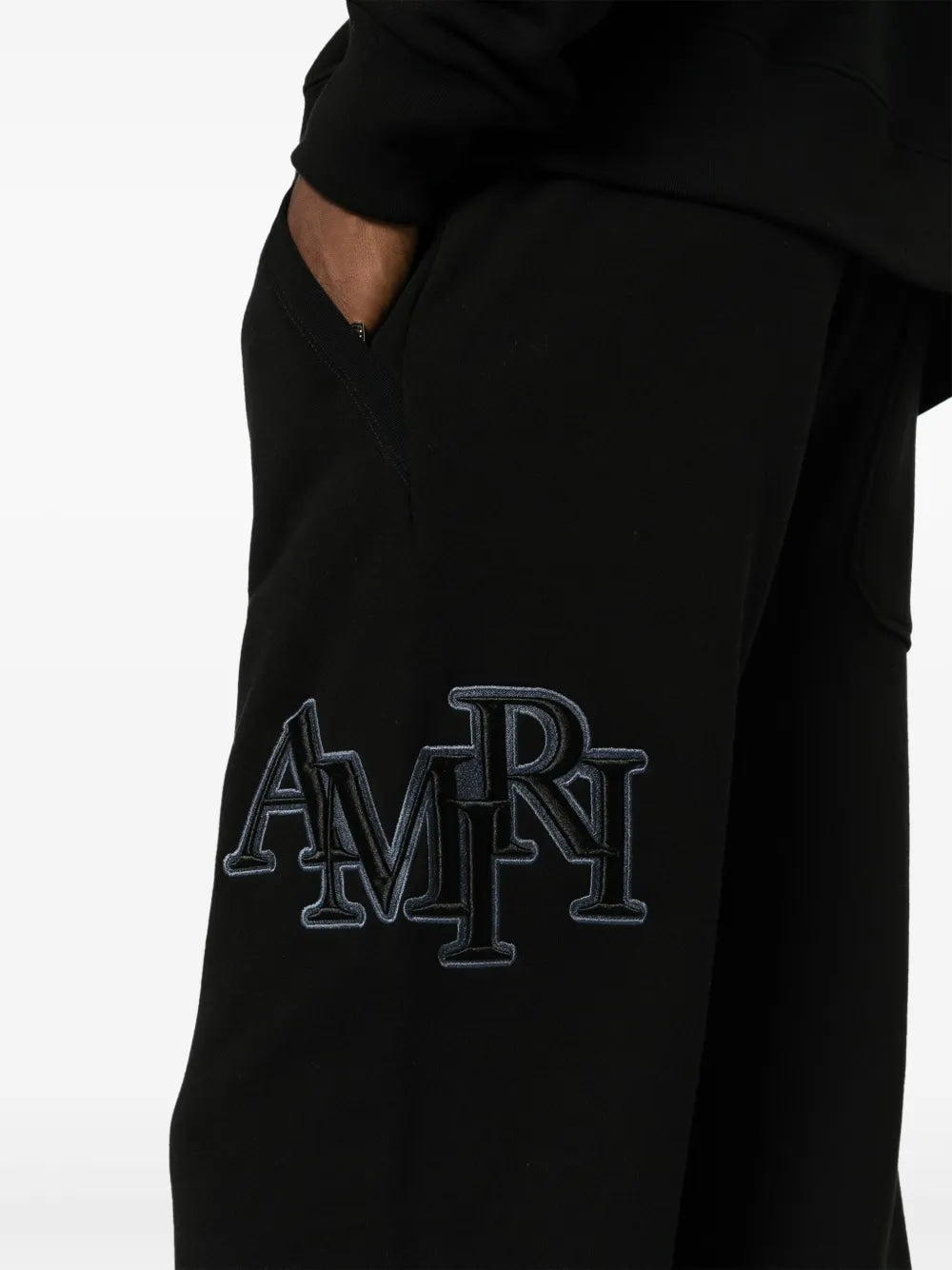 AMIRI STAGGERED SWEATPANTS BLACK