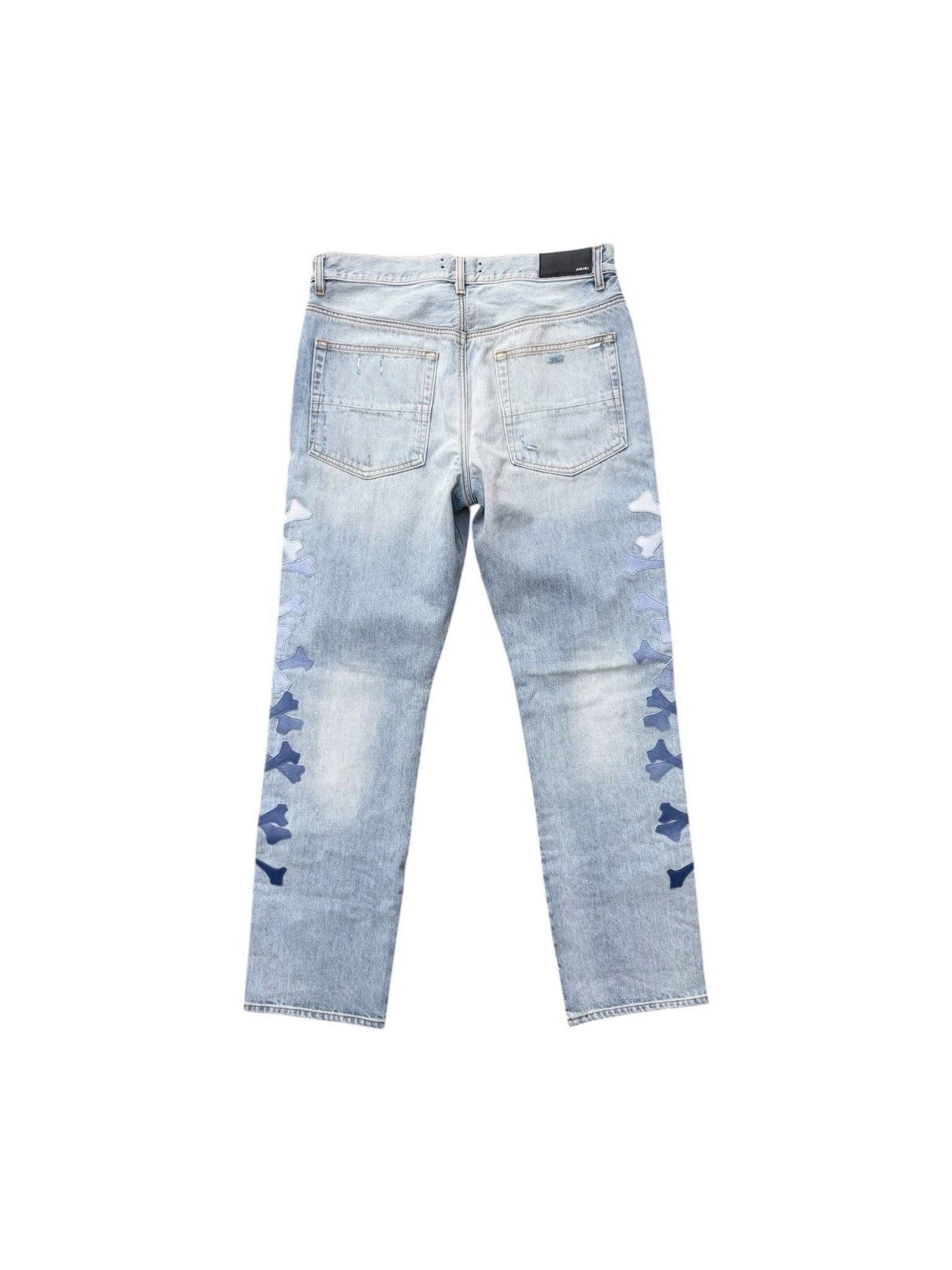 AMIRI GRADIENT BONES BLUE DENIM JEANS