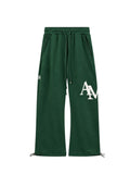 AMIRI STAGGERED SWEATPANTS DARK GREEN