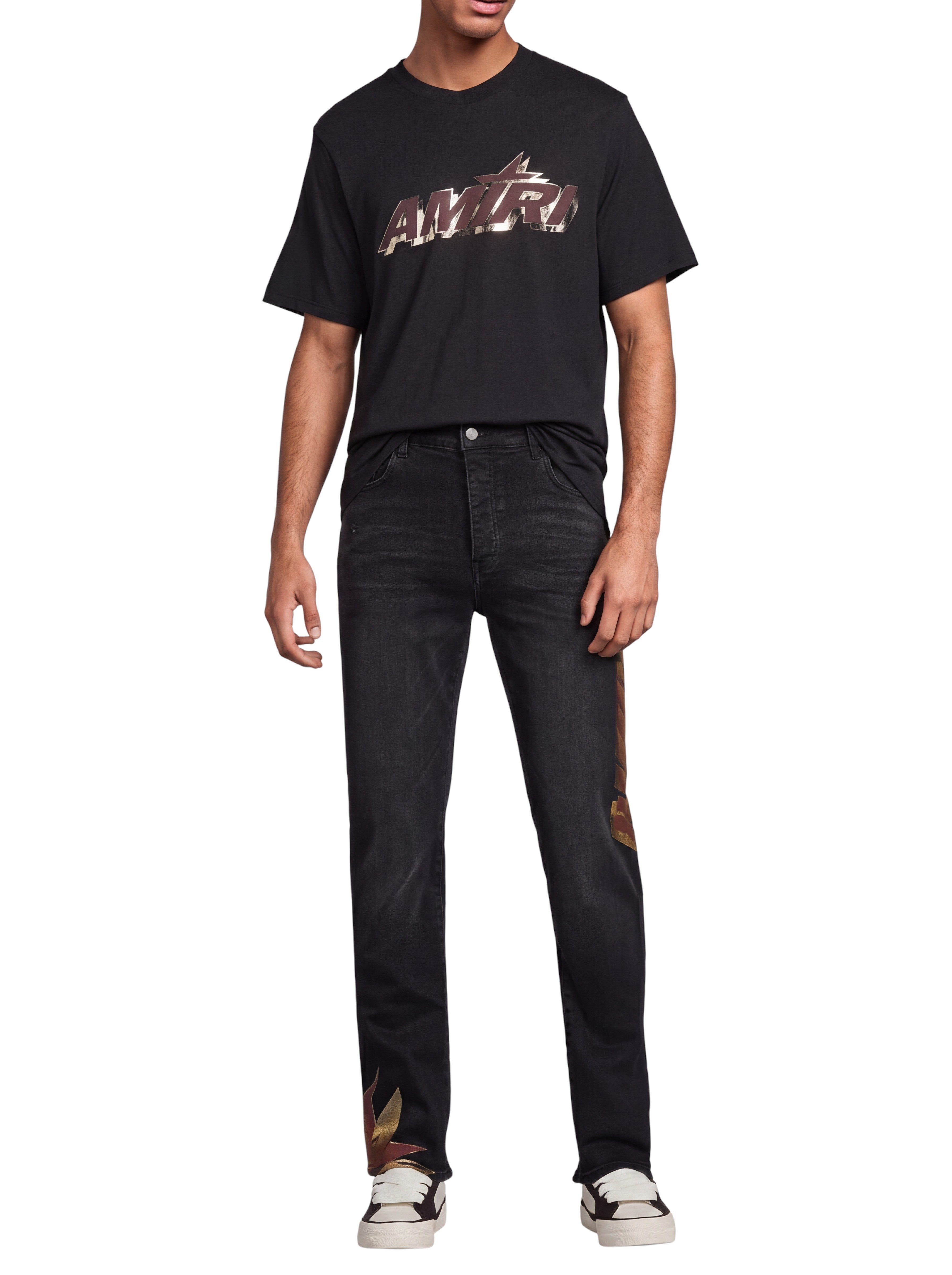 Vaqueros slim negros AMIRI Shadow de The Hype Company con detalles gráficos en el bajo y diseño de cinco bolsillos.