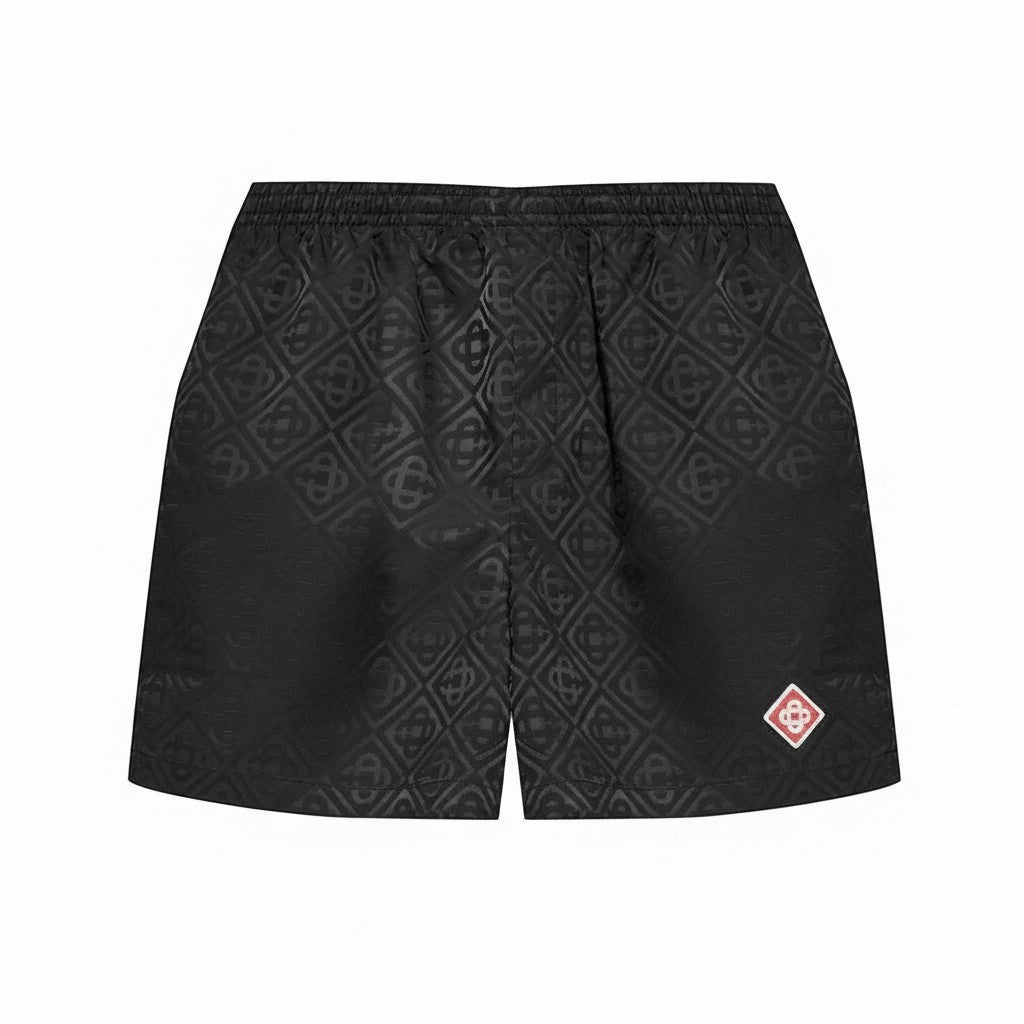 Bañador negro con monograma de The Hype Company, diseño Casablanca con estampado geométrico y parche de logo.