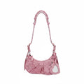 Bolso Balenciaga Le Cagole rosa con purpurina y espejo en forma de corazón de The Hype Company