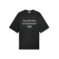 Camiseta The Hype Company Acne Studios Stockholm 1996 en negro desteñido con estampado gráfico desgastado