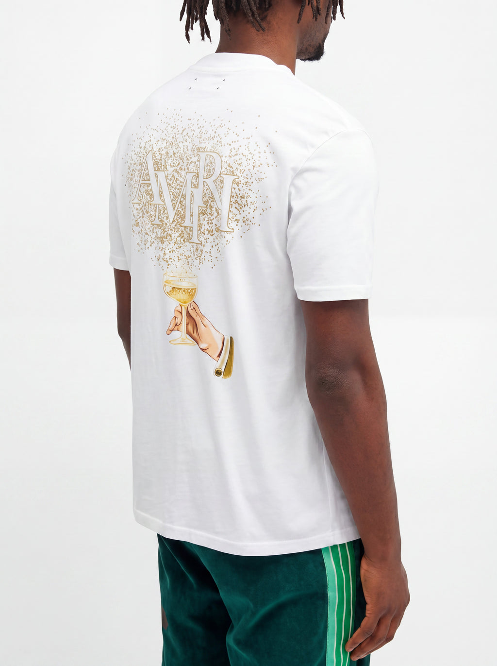 Camiseta blanca de algodón The Hype Company con estampado de copa de champán y logo AMIRI en la espalda
