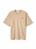 Camiseta de algodón color champán de The Hype Company con el logo de corazón rojo bordado en el pecho
