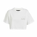 Camiseta corta blanca de The Hype Company con estampado de estrella plateada y logo de AMIRI.