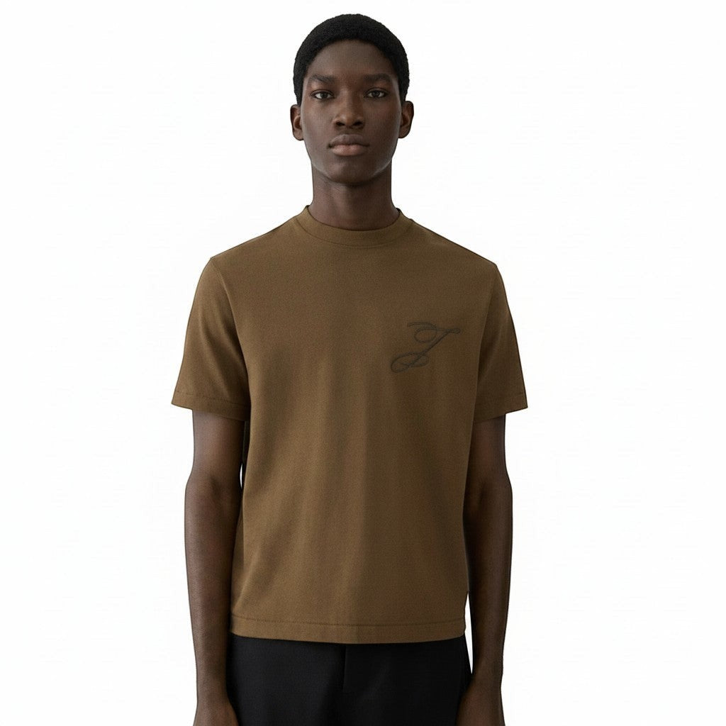 Camiseta marrón de algodón de The Hype Company con bordado de logo en el pecho, cuello redondo y manga corta.