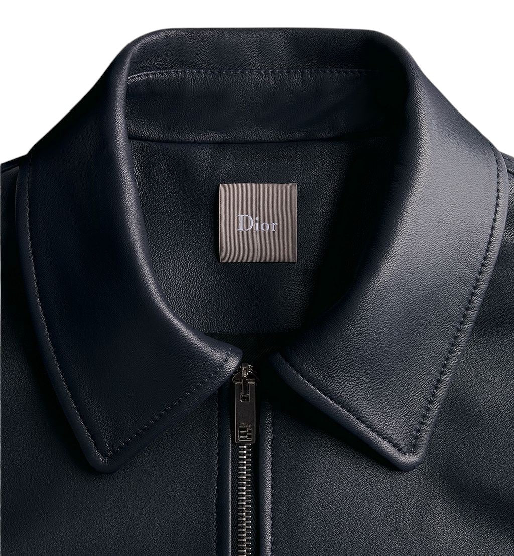 Chaqueta con cremallera The Hype Company de piel de cordero azul marino con etiqueta Dior en el cuello