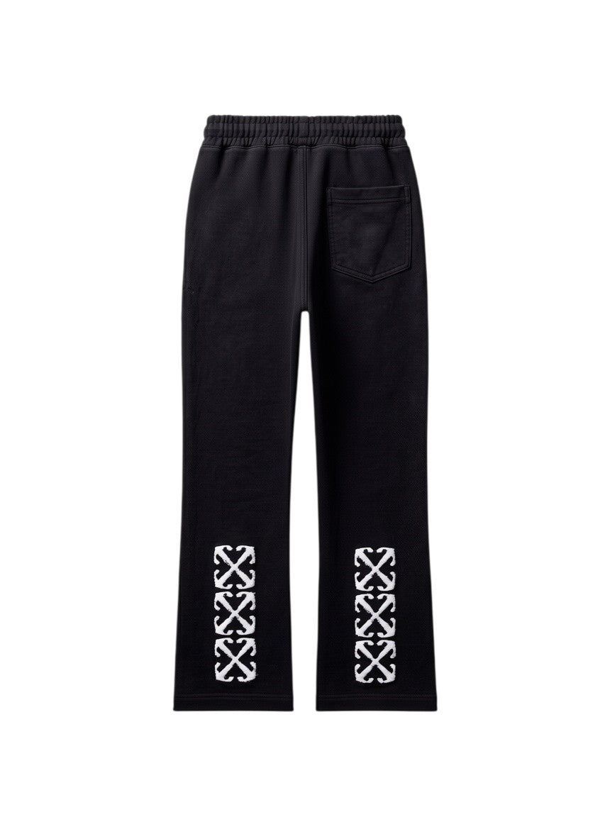 Pantalones de chándal negros The Hype Company con estampado de flechas blancas en la parte inferior de las piernas