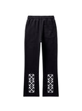 Pantalones de chándal negros The Hype Company con estampado de flechas blancas en la parte inferior de las piernas