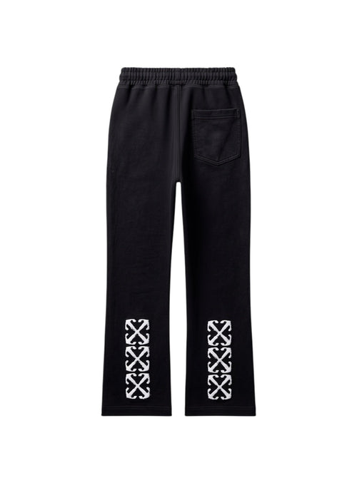 Pantalones de chándal negros The Hype Company con estampado de flechas blancas en la parte inferior de las piernas