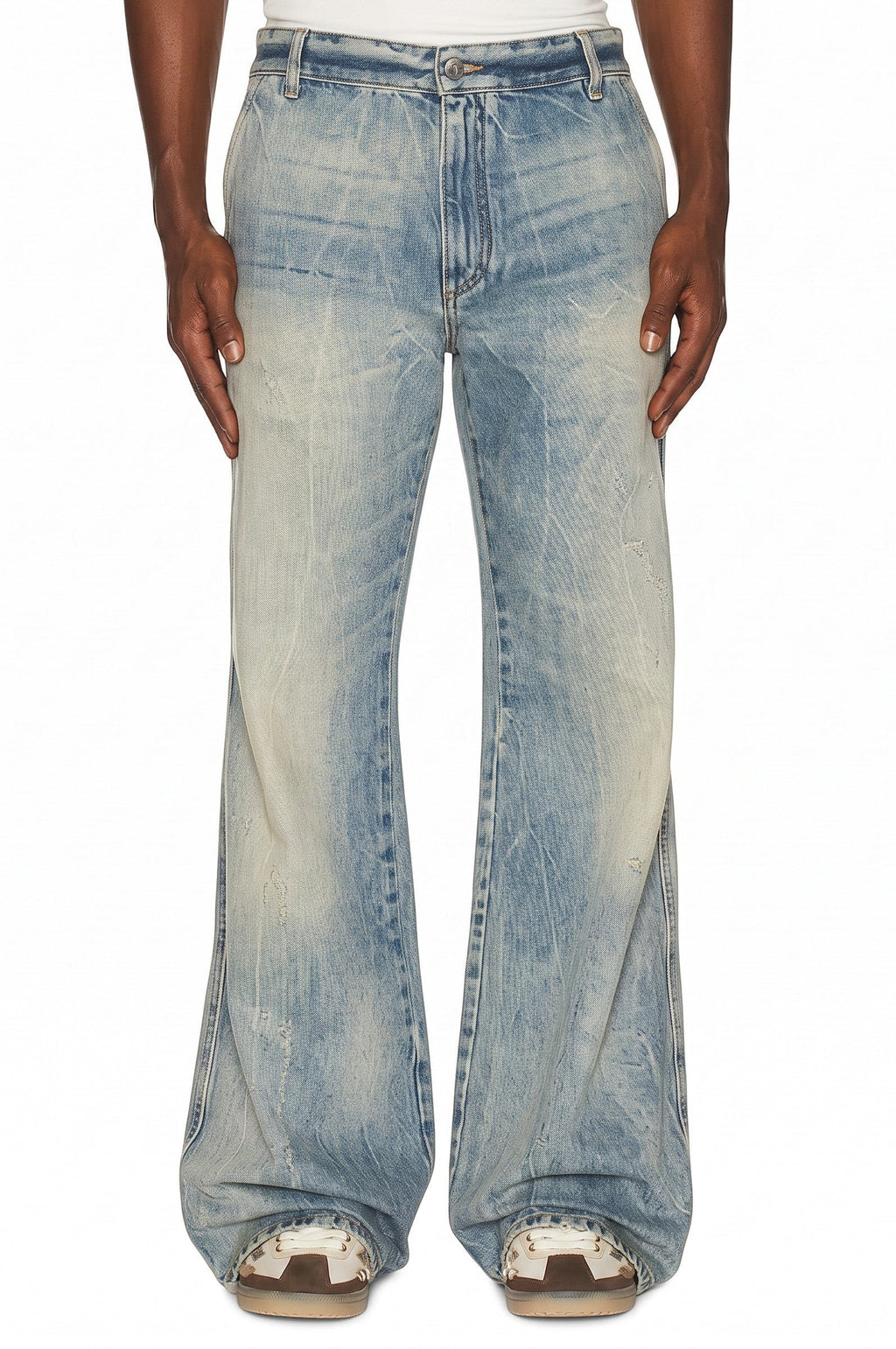 Vaqueros boot cut de mezclilla índigo desgastada de The Hype Company con ajuste relajado y detalles de textura