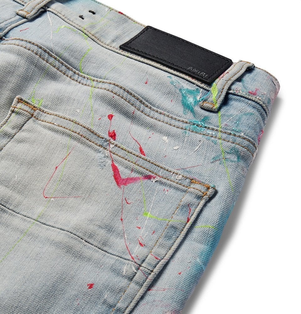 AMIRI INDIGO DISTRESSED PAIN SPLATTERED JEANS