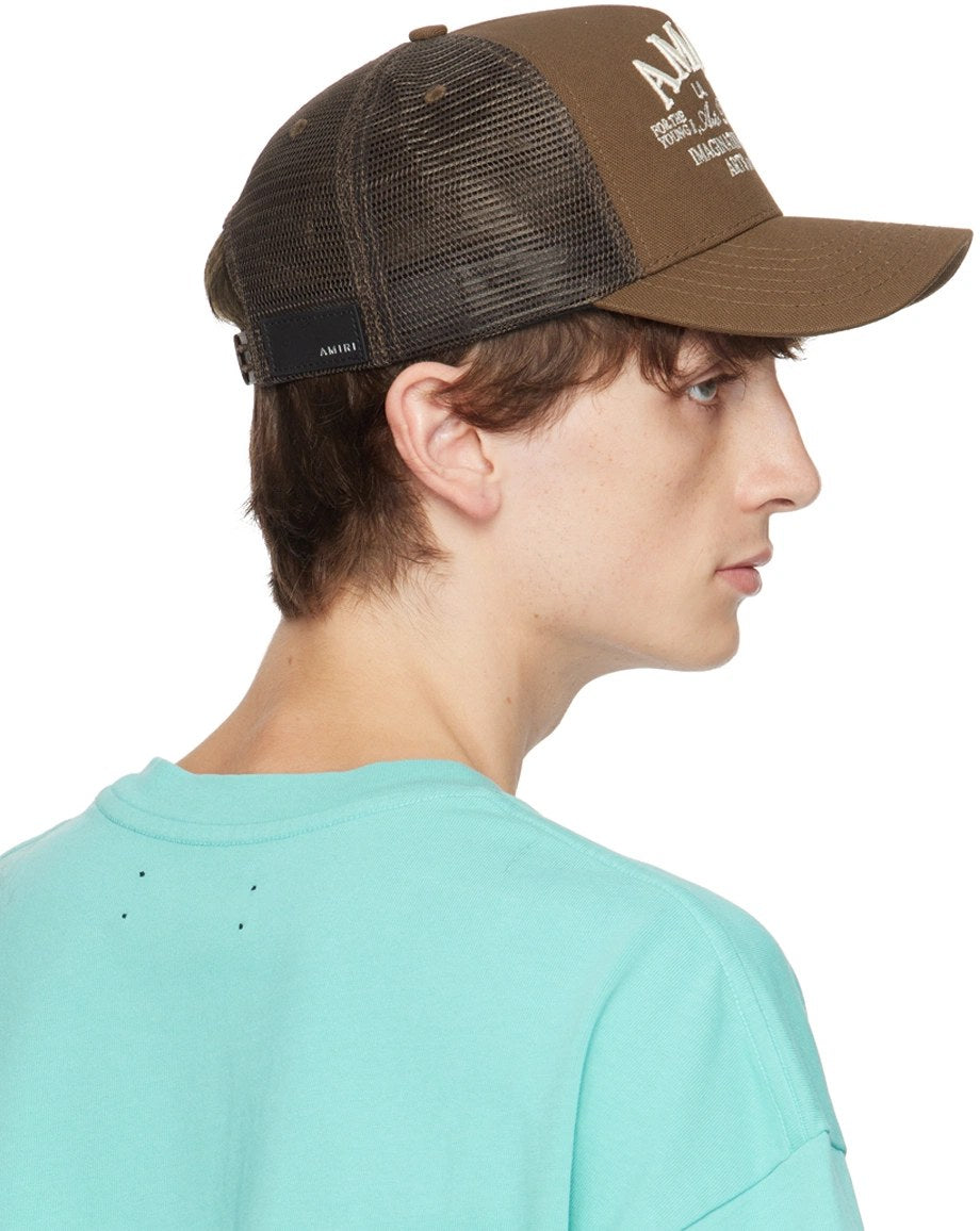 AMIRI ARTS DISTRICT TRUCKER HAT BROWN