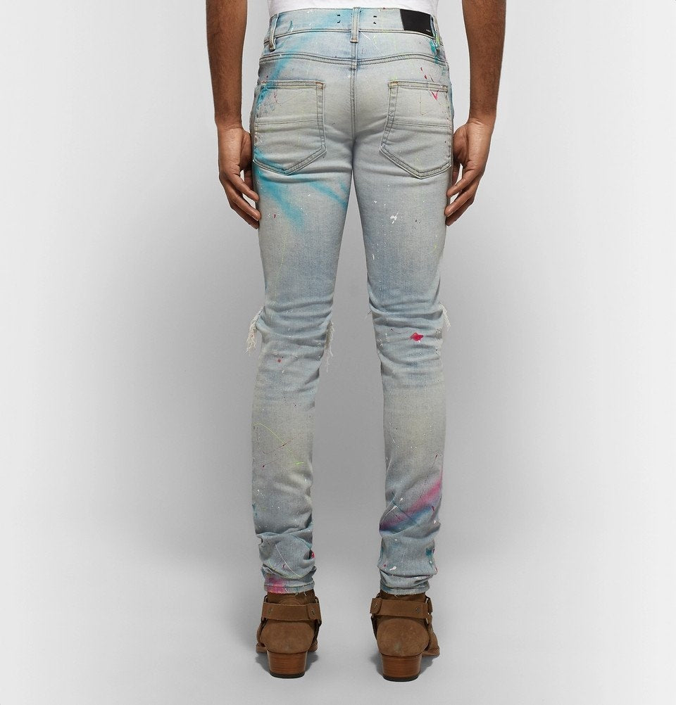 AMIRI INDIGO DISTRESSED PAIN SPLATTERED JEANS