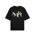 AMIRI STAGGERED LOGO T-SHIRT BLACK