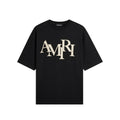 AMIRI STAGGERED LOGO T-SHIRT BLACK